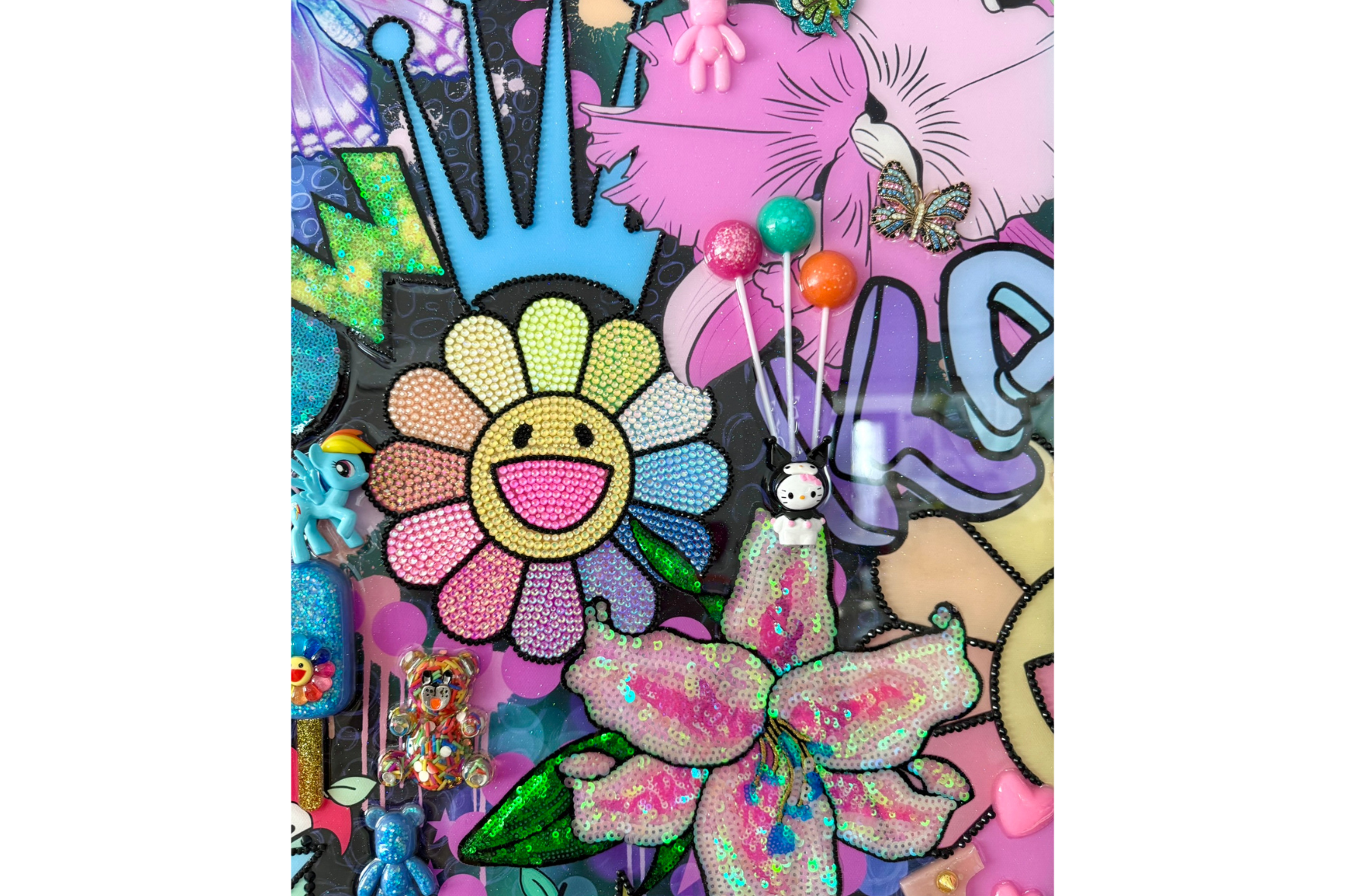 Colorful art piece with flowers, abstract shapes, and text on a white background